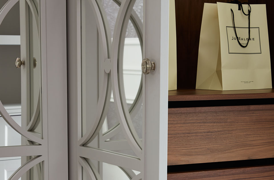 Detail showing interior and exterior of luxury fitted wardrobes